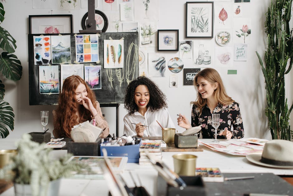 A group of people participating in an art workshop, showing visible signs of relaxation and enjoyment