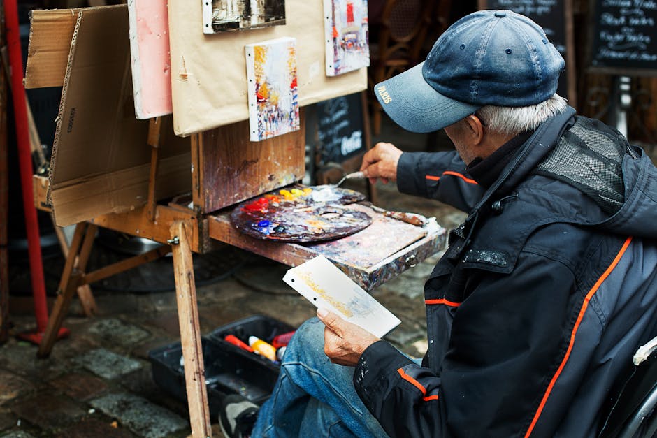 An artist creatively solving a painting challenge on their canvas