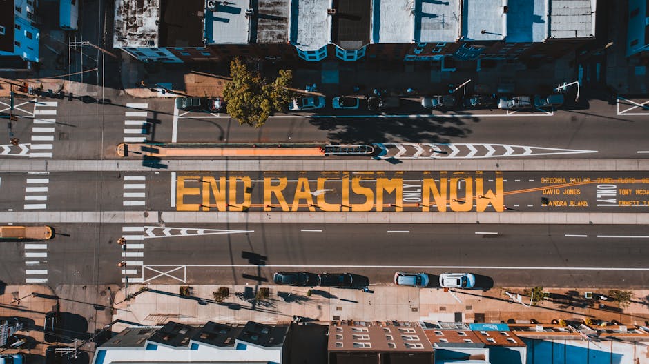 An aerial view of a massive Black Lives Matter mural painted on a city street