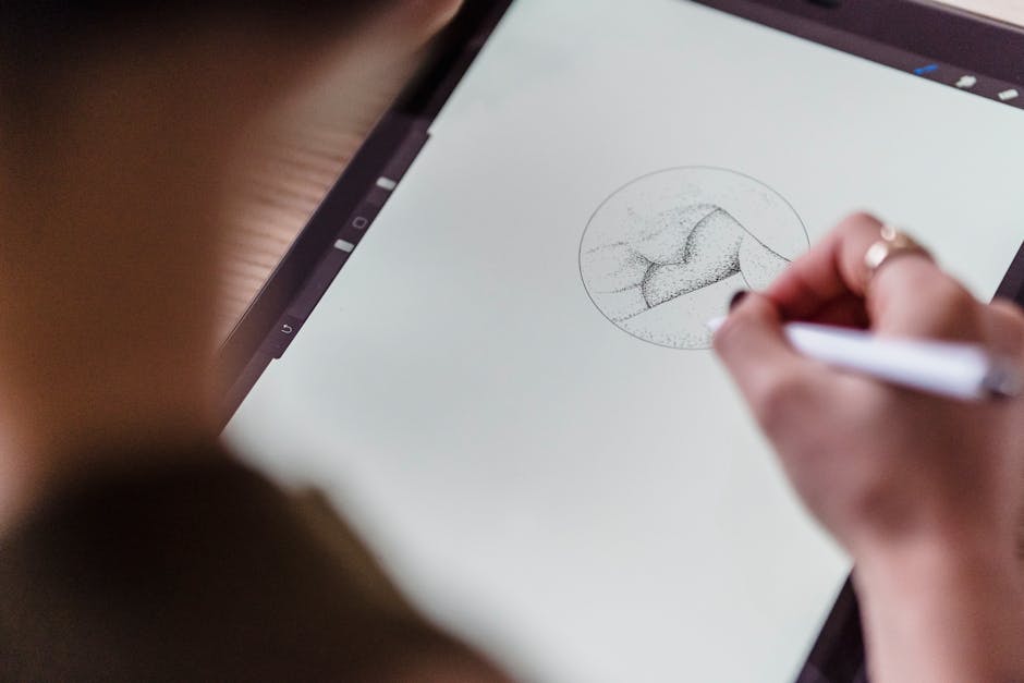 A digital artist creating a portrait on a tablet