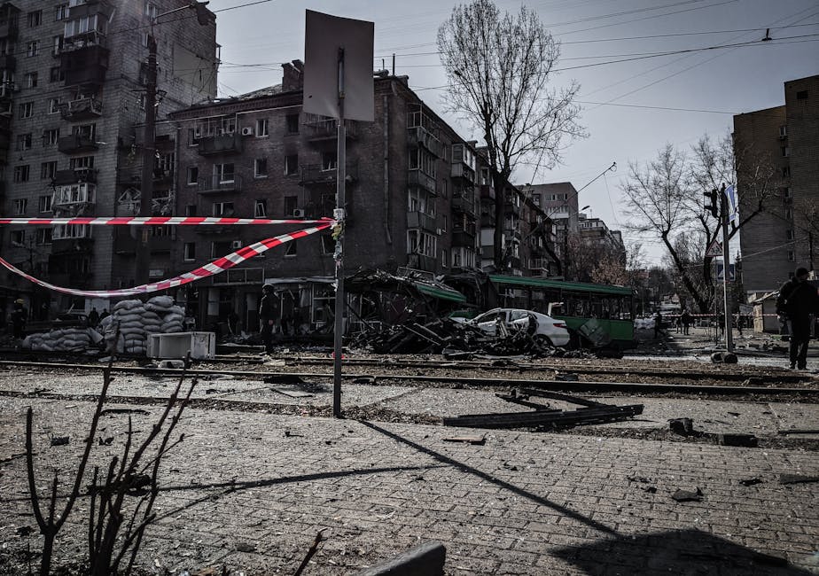 The aftermath of the bombing of Guernica, showing destroyed buildings and shocked survivors amid the rubble