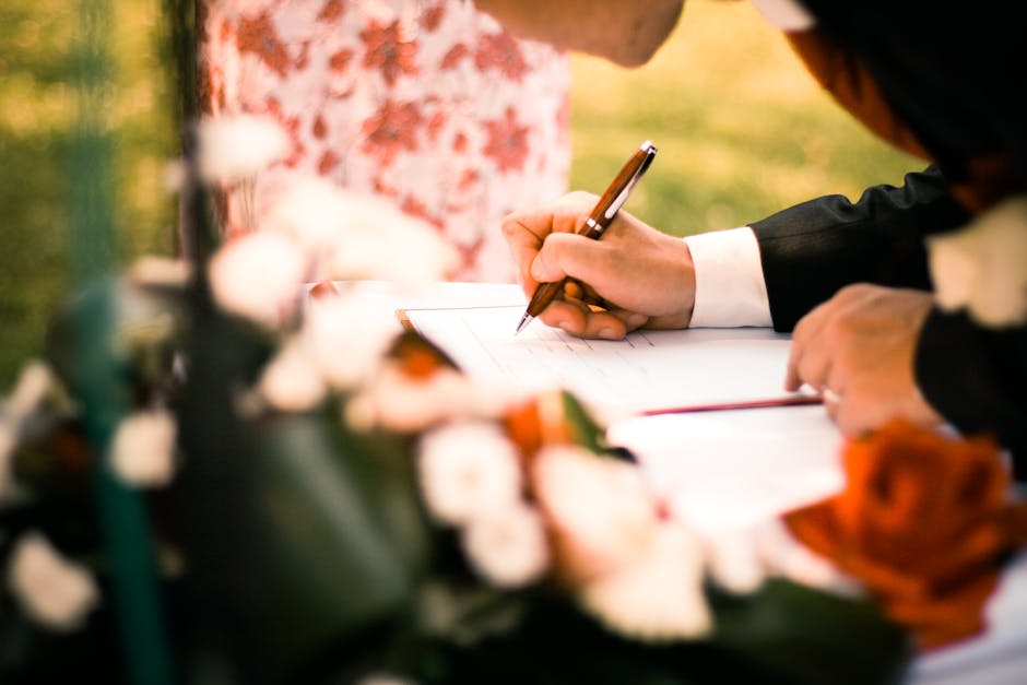 Two people negotiating terms of an art licensing contract