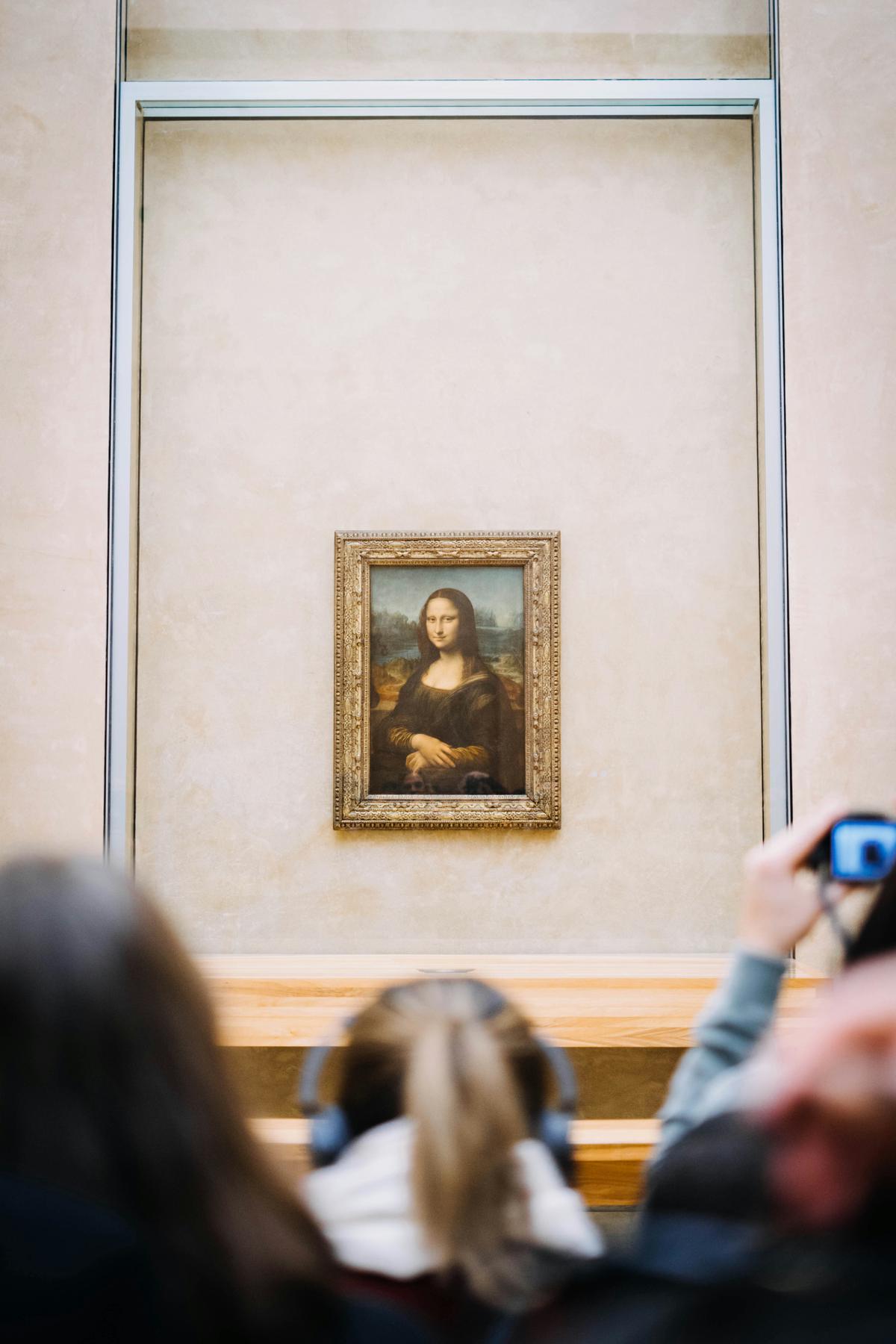 The Mona Lisa alongside modern interpretations of the iconic portrait