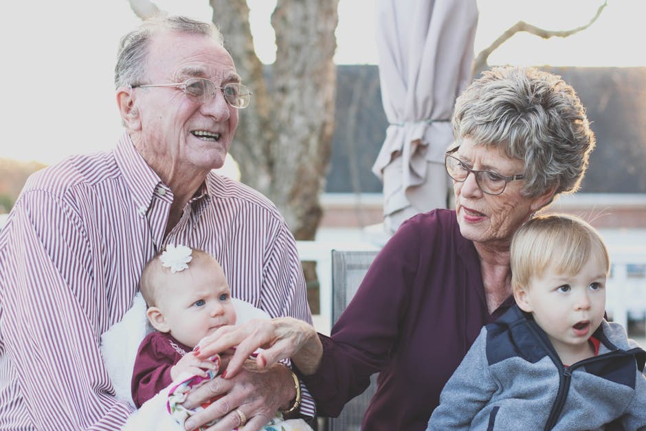 A multi-generational family posing for a portrait