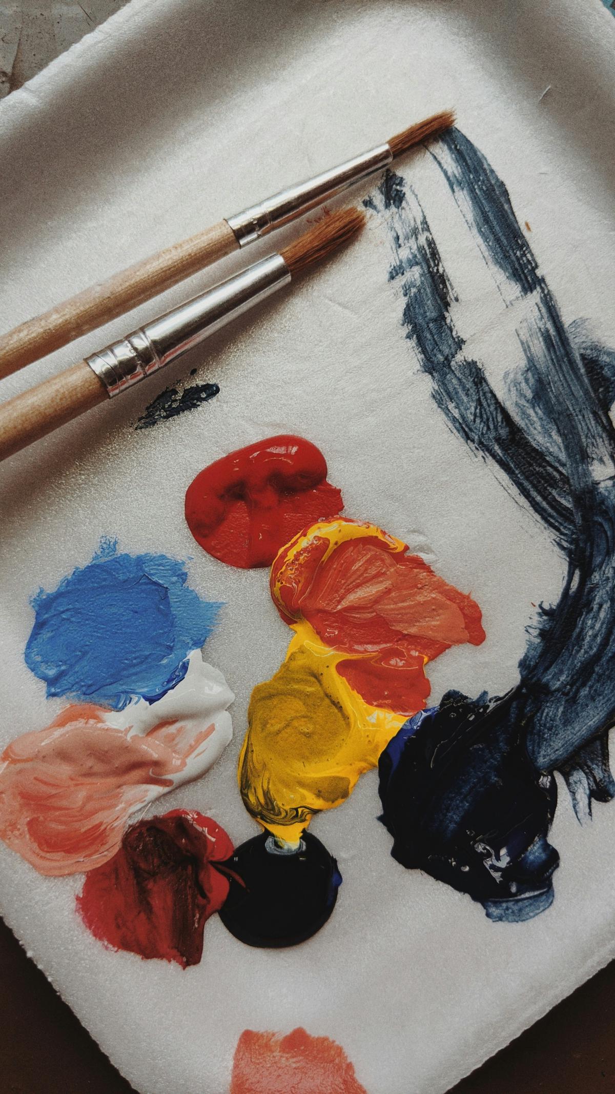 A Renaissance artist's palette with ultramarine, vermilion, and lead white pigments