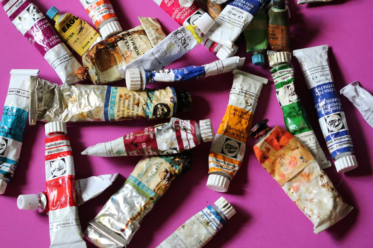 Antique paint tubes and brushes similar to those used by Van Gogh, showcasing his color palette
