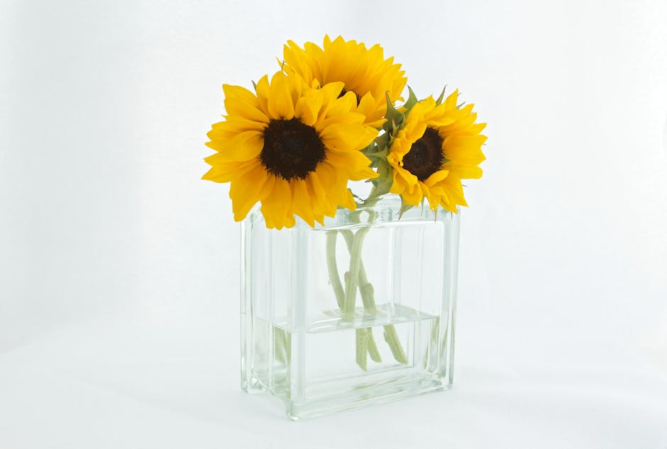 Van Gogh's Sunflowers painting with vibrant yellow flowers in a vase